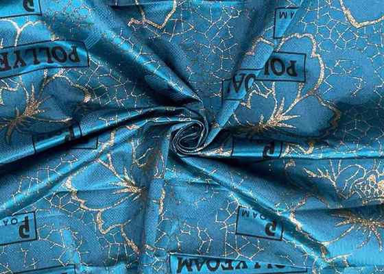 il filo di ordito del poliestere di 240cm ha tricottato la polvere impermeabile blu dell'oro del tessuto stampata